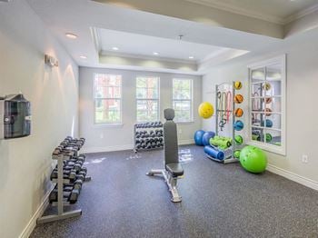 24-Hour fitness center, spin room, cardio room & free weights